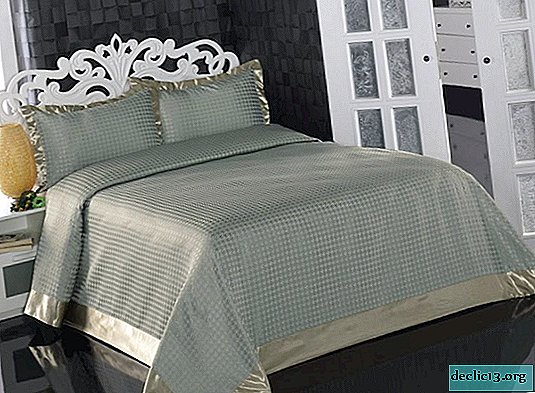 Los matices de elegir colchas para una cama doble, una combinación con el interior