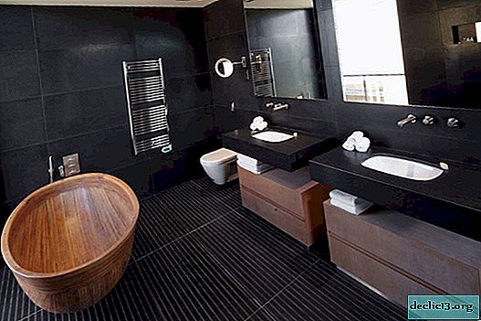Črna kopalnica: temna notranjost v elegantni interpretaciji