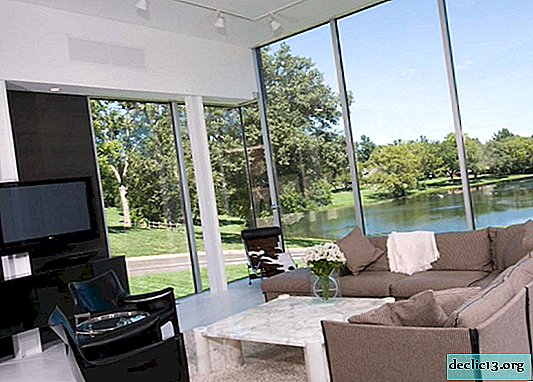 Interiør med panoramavinduer - la det maksimale lyset komme inn i huset ditt