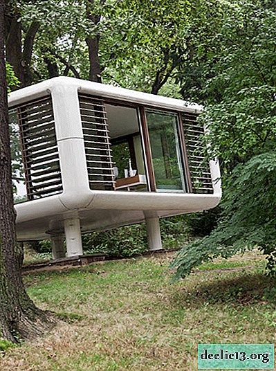 Unusual cube house with glass walls