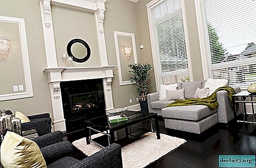 The gray living room is a sign of particular practicality and restrained elegance.