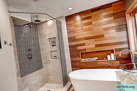 Paredes en el baño: una variedad de materiales de acabado en un diseño moderno