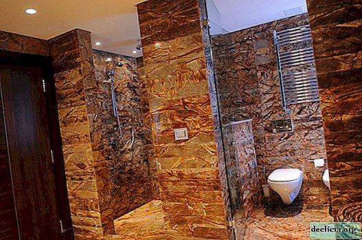 Banheiro com acabamento em pedra - interior real